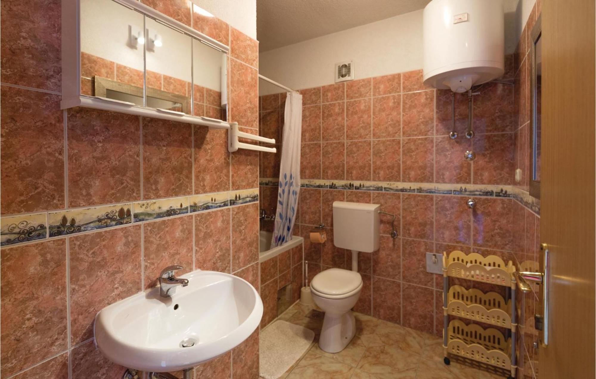 Nice Apartment In Makarska With House Sea View Esterno foto